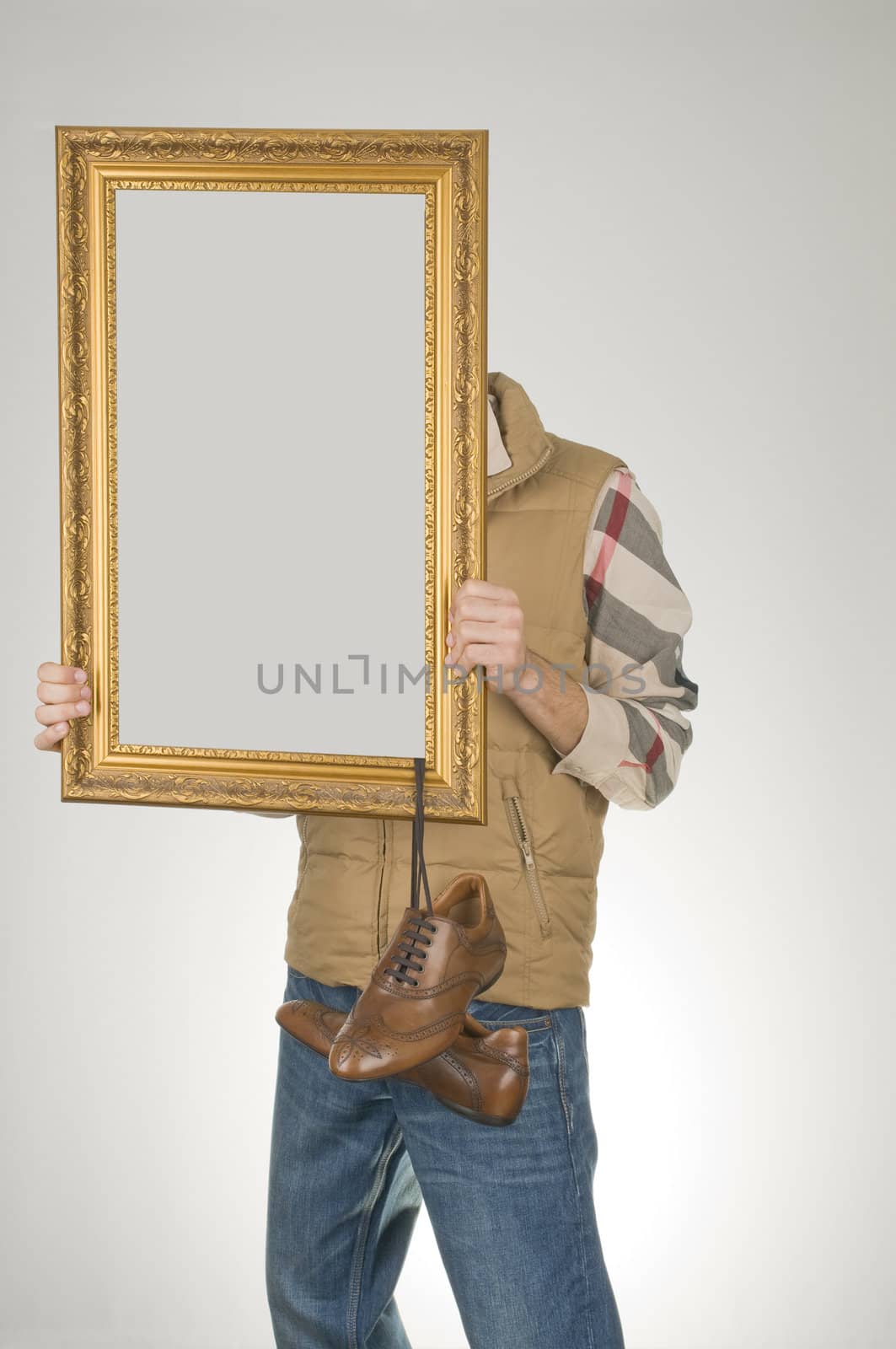 Man holding empty frame