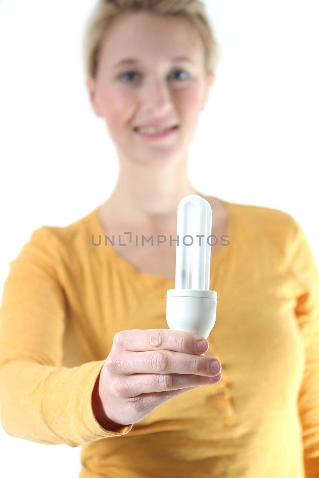 girl holding a energy-saving lamp by Teka77