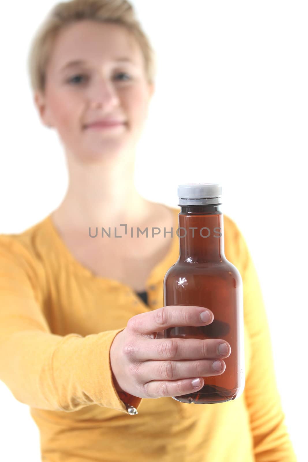 girl holding a brown plain bottle by Teka77