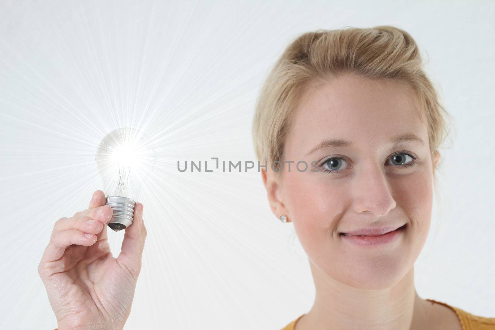 girl with glowing light bulb