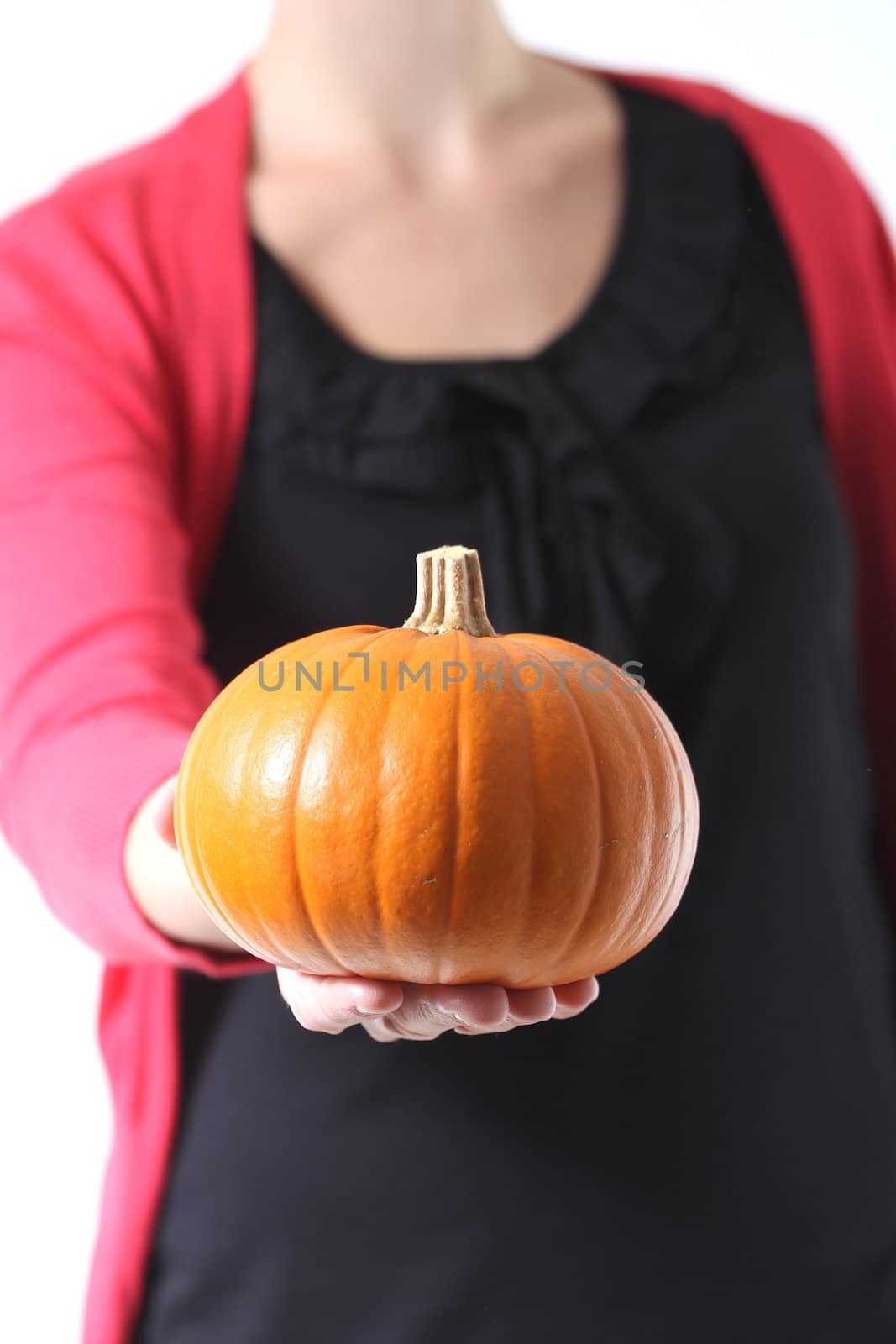 girl holding a pretty pumpkin by Teka77
