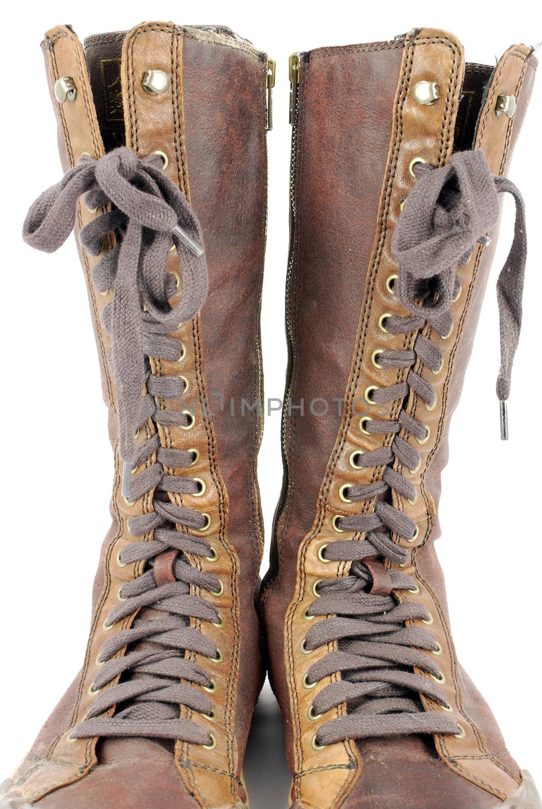 Tall leather boots with cross shoelace