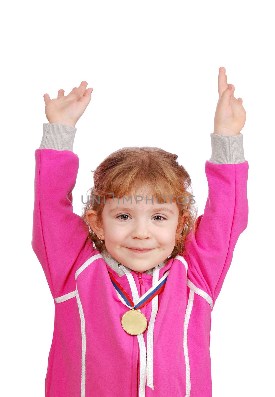 Little girl with gold medal victory studio shot