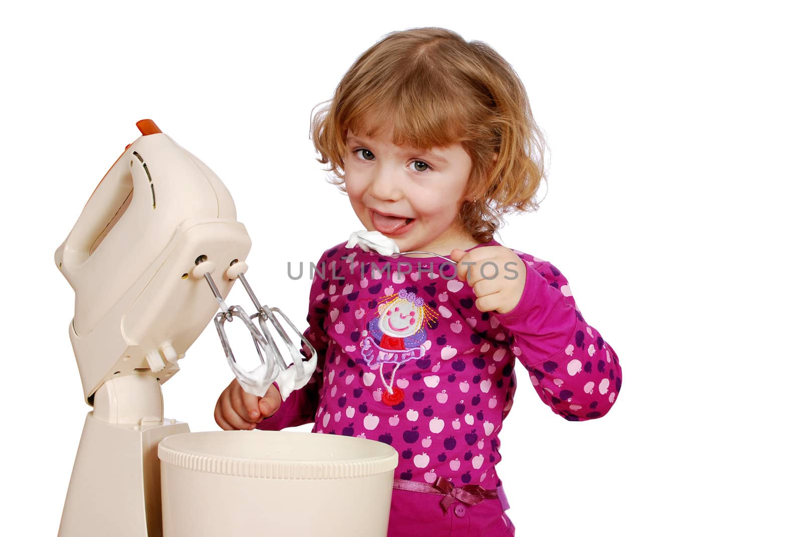 Little girl eating sweet cream for cake