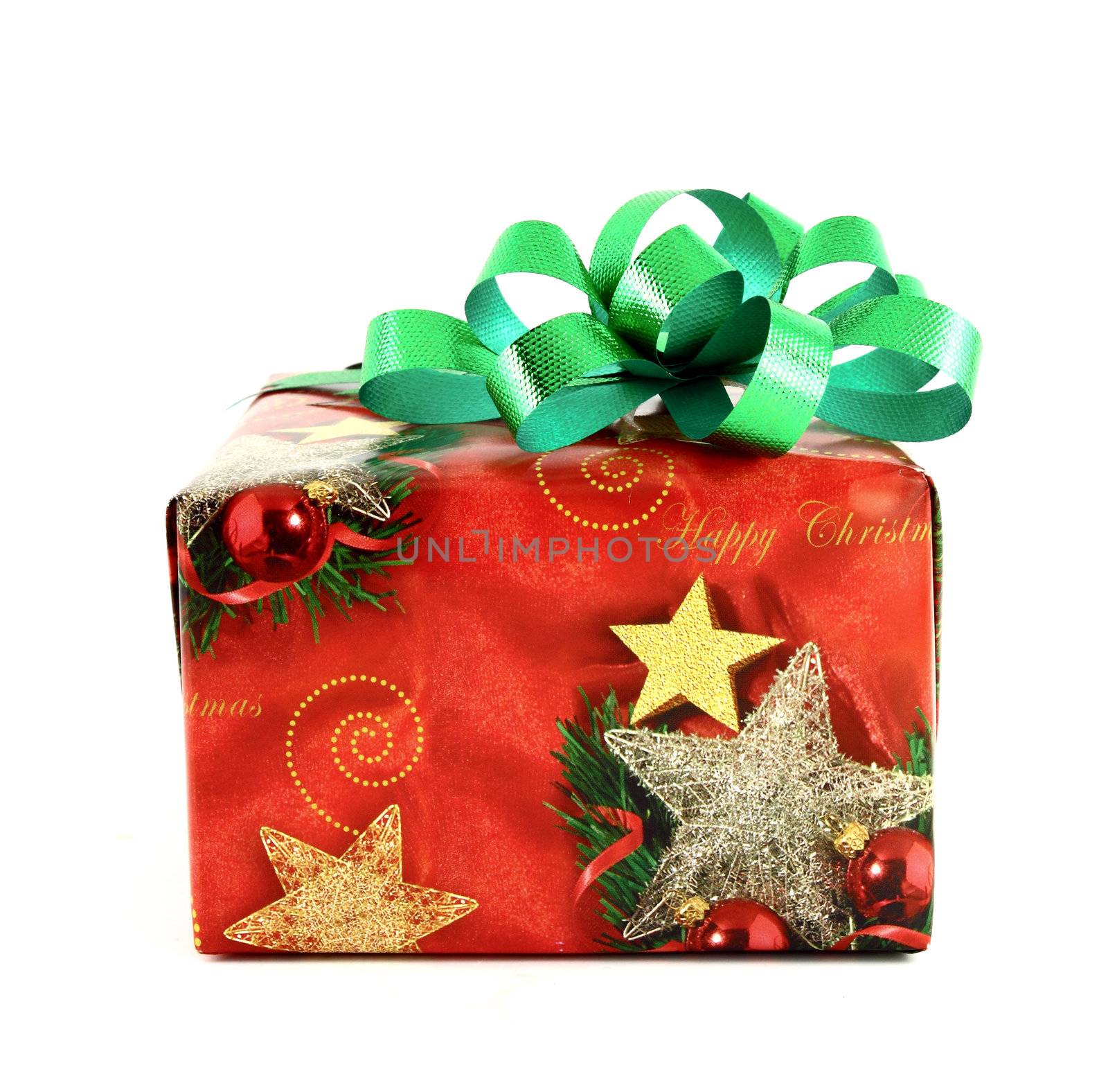 Christmas gift box with green bow isolated on white background by geargodz