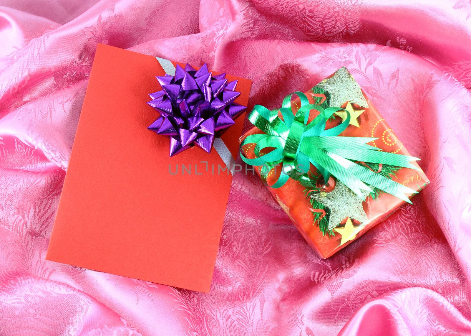 gift box and card on pink satin by geargodz