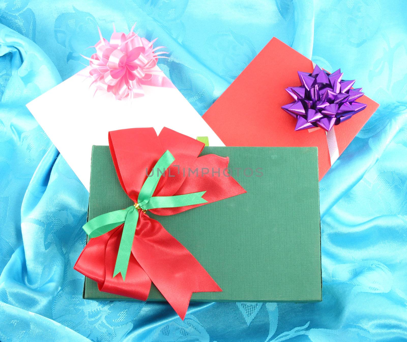 gift box and card on blue satin