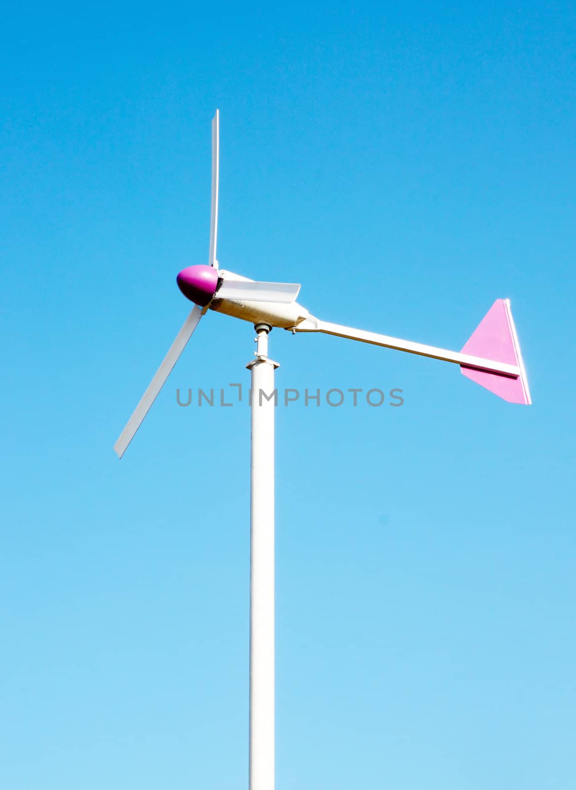 wind turbine on blue sky background by geargodz
