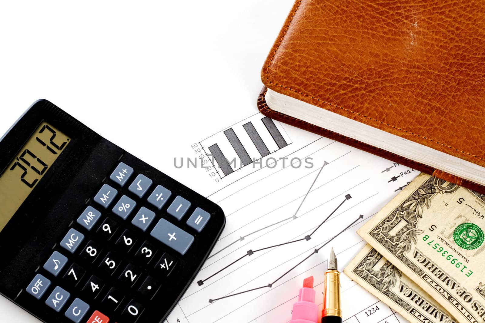 Account statements, credit calculations, calculators, pen and dollar bills