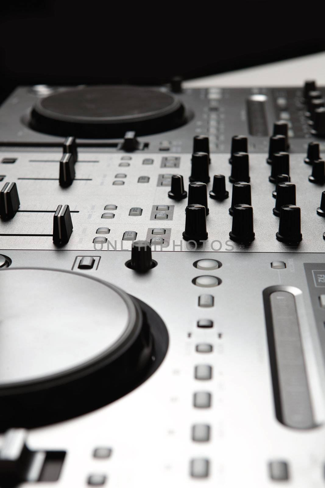 Dj mixer equipment to control sound and play music