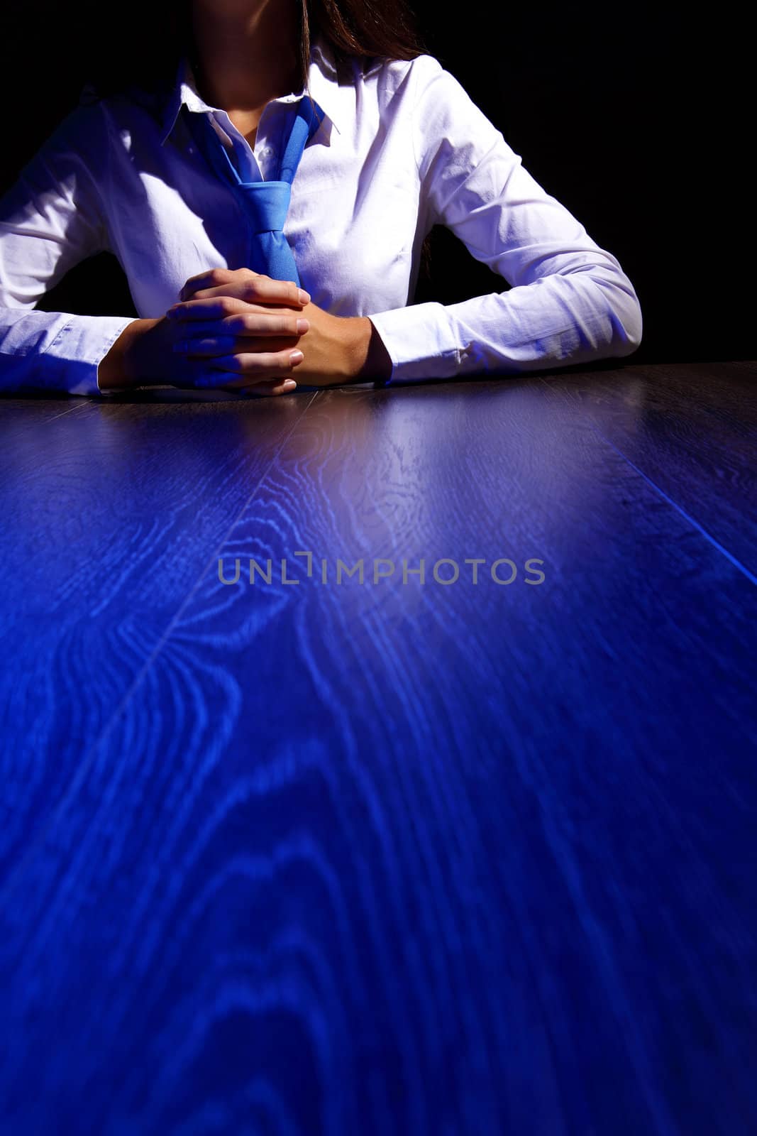 Business woman at office sitting at table