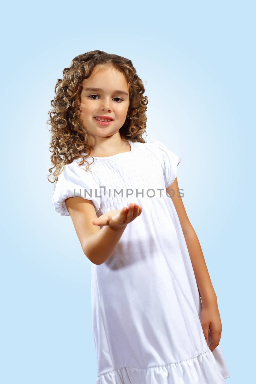 Portrait of an adorable preschool age girl wearing a Christmas holiday outfit