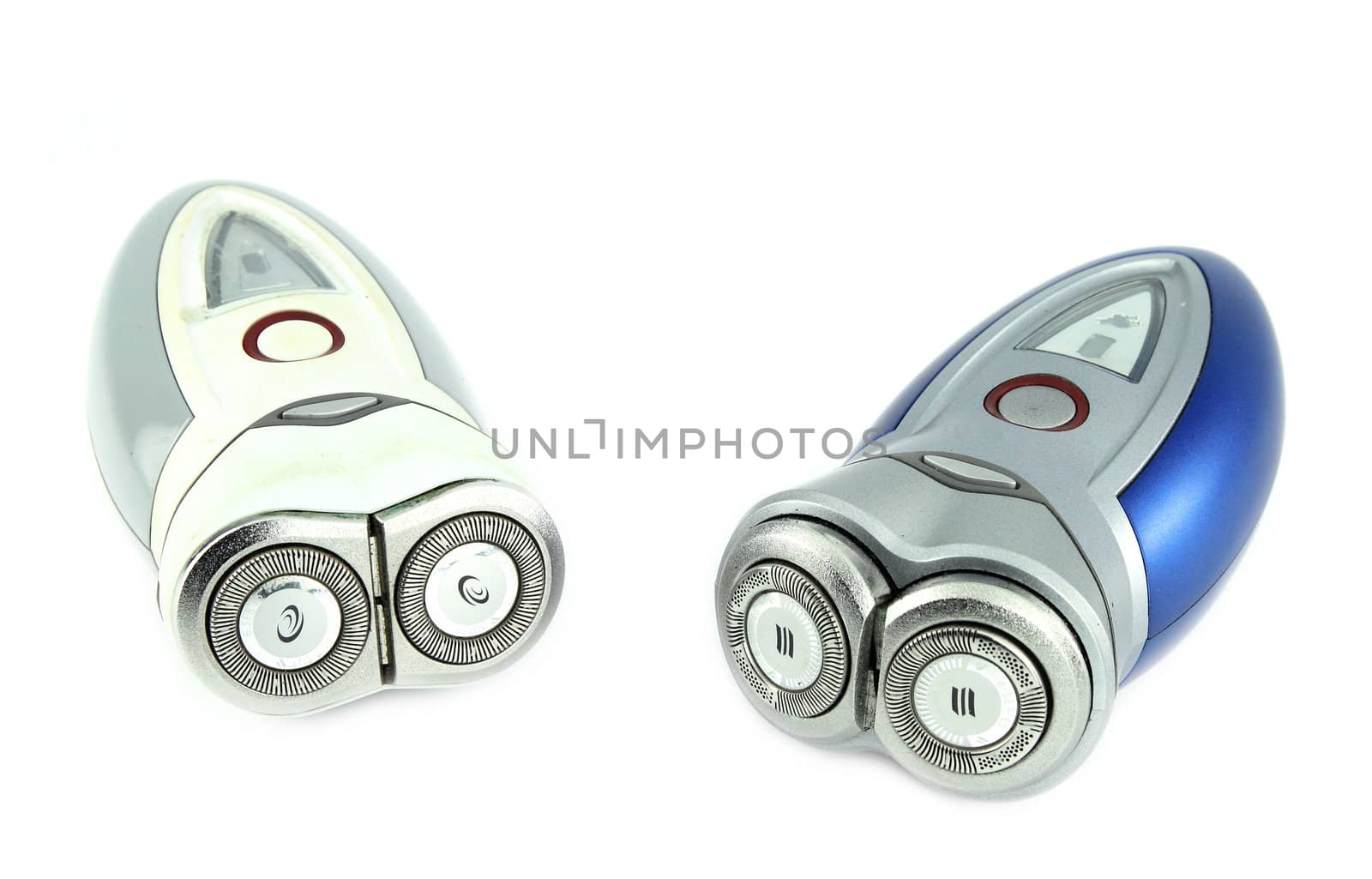 two electric shaver isolated with white background