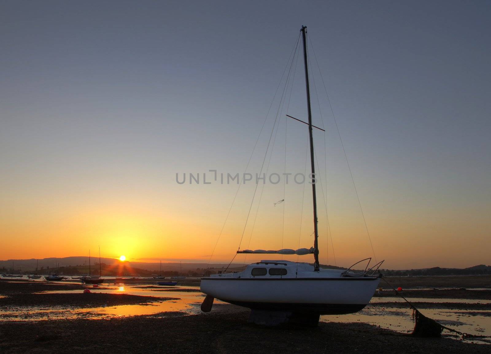 Silhuetted boats  by olliemt