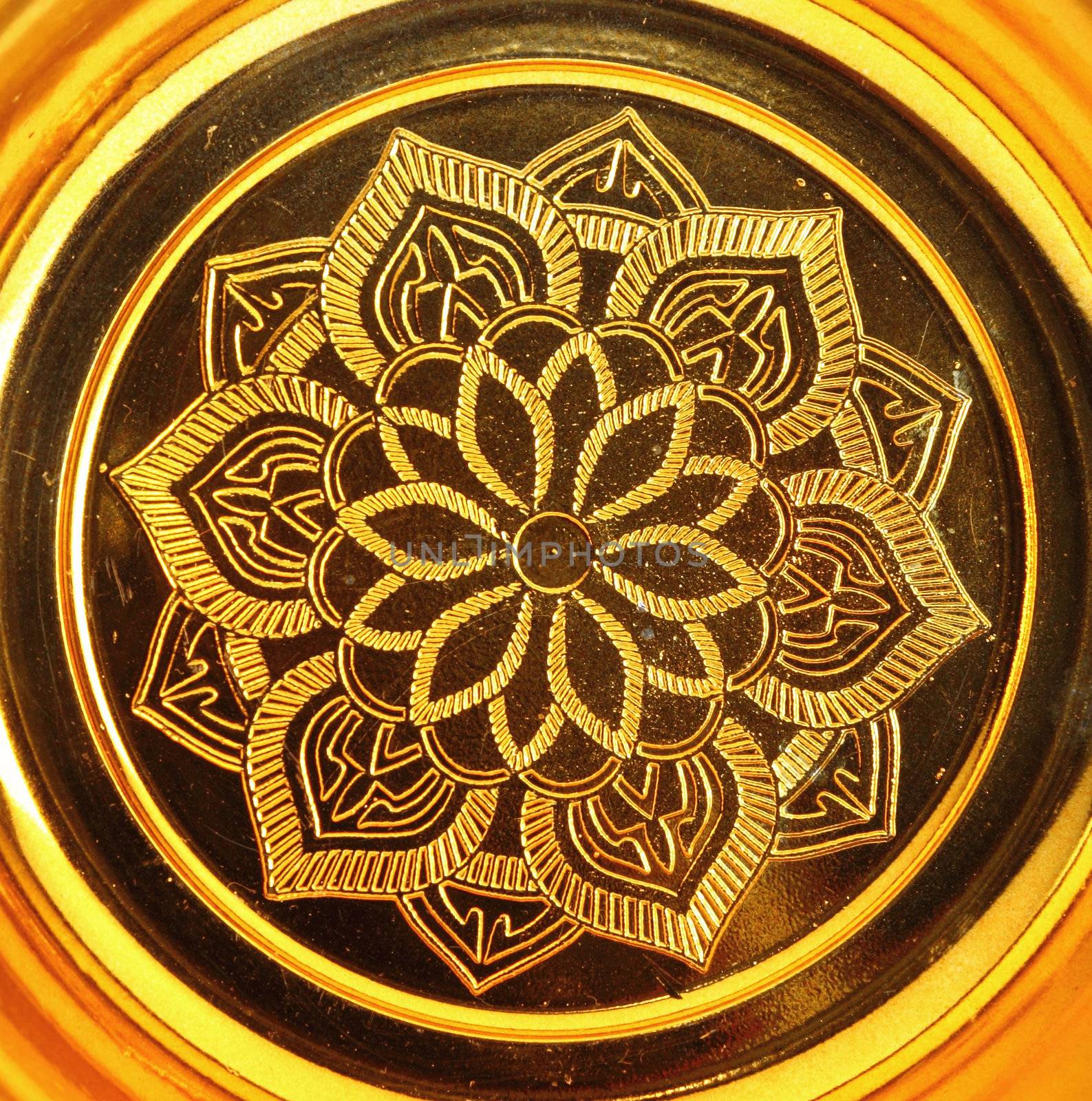 lotus pattern on gold tray of buddha