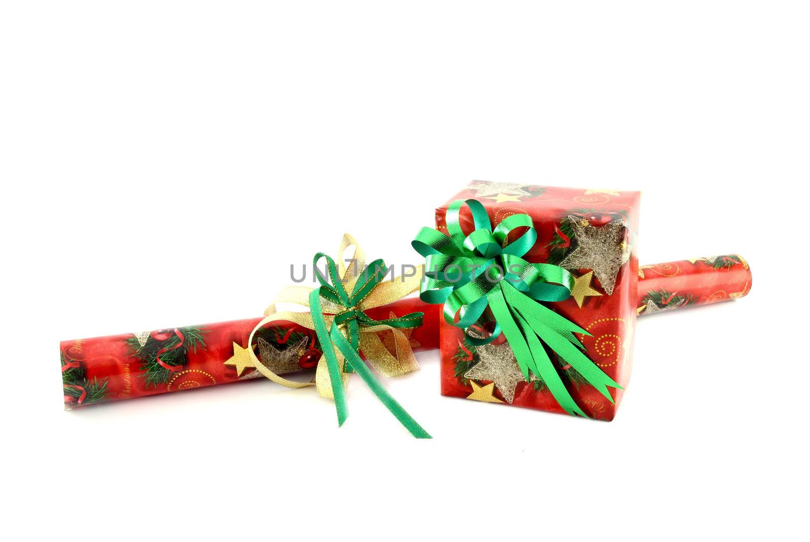 gift box with roll of paper on white background by geargodz