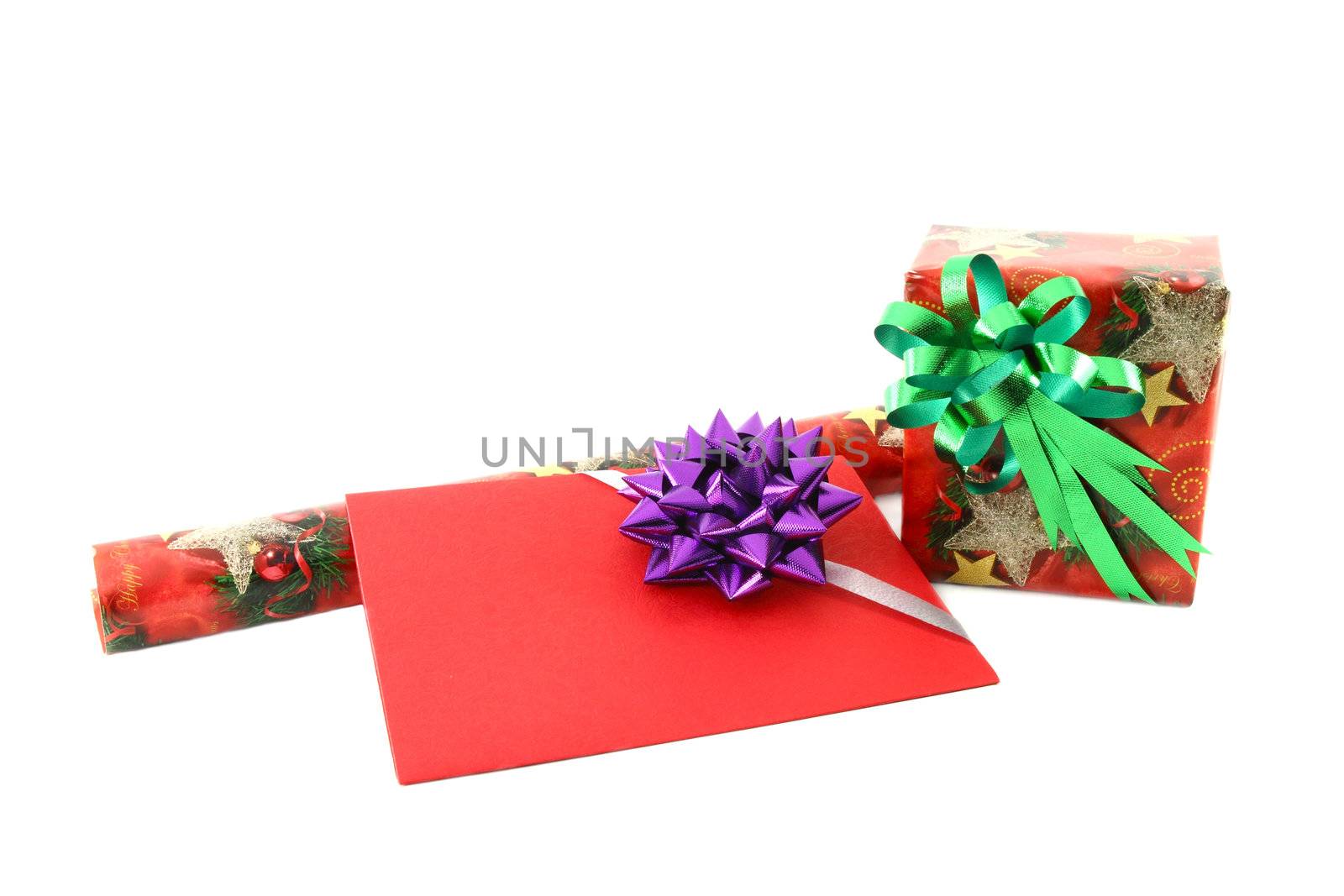 Gift box and roll paper with gift card on white background