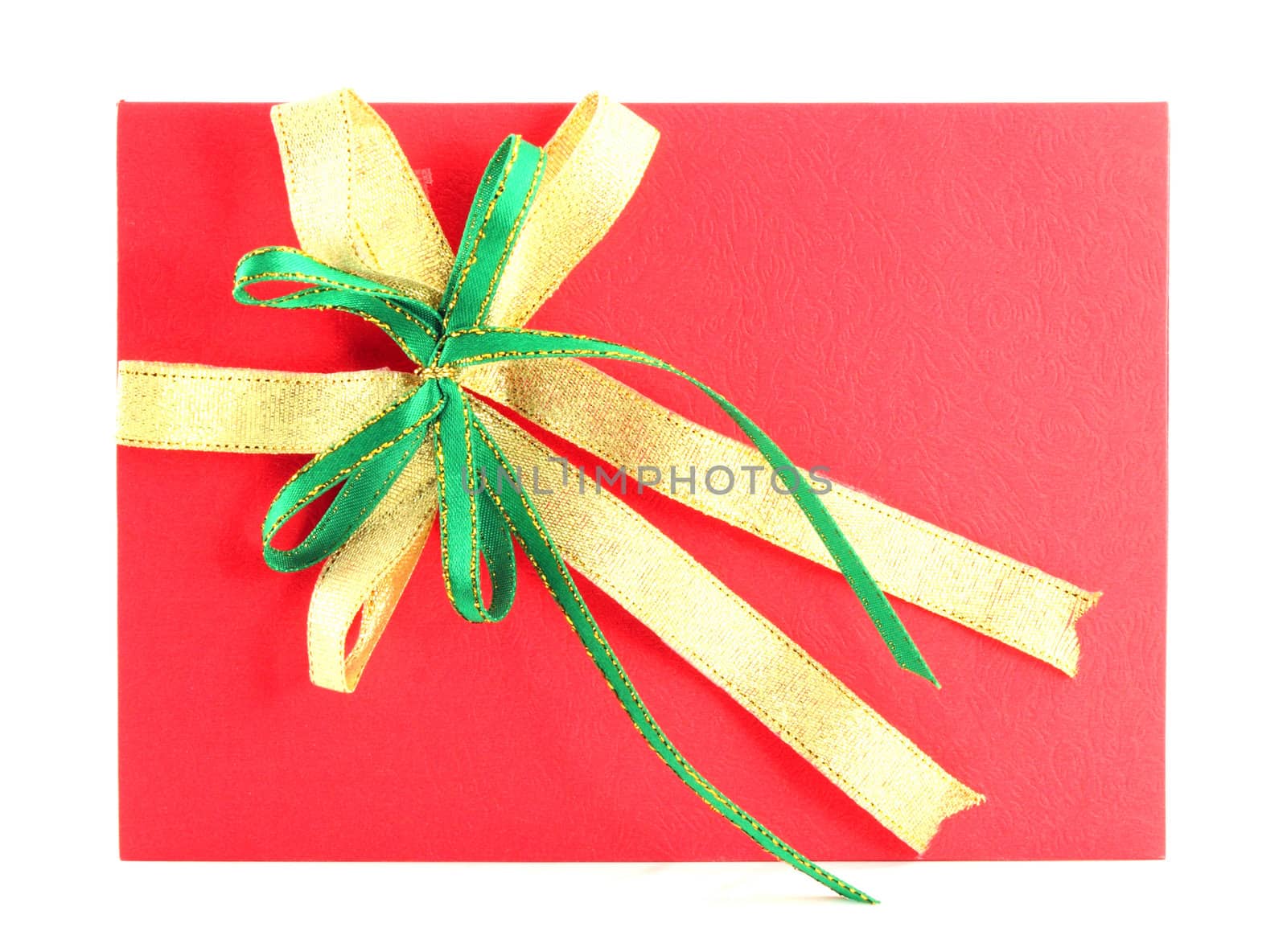 red gift card with green and yellow bow on white background