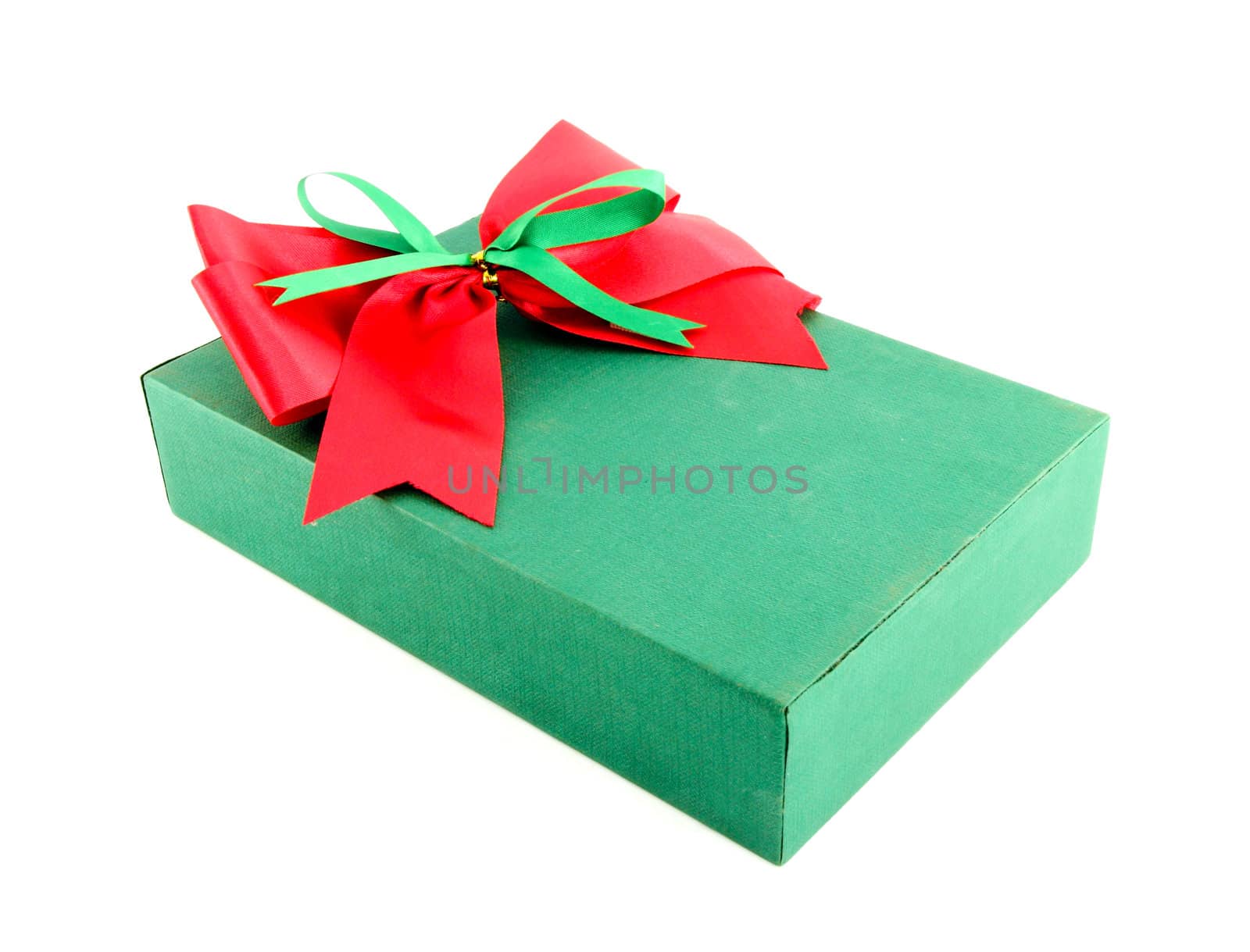 green gift box with red ribbon on white background by geargodz