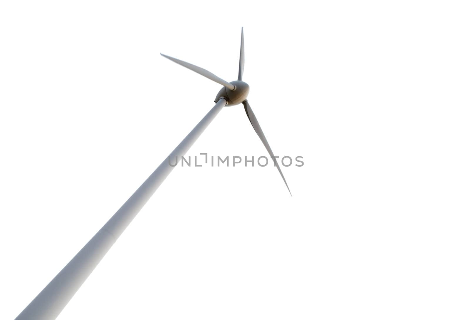 Low angle of the wind turbine isolated against white.