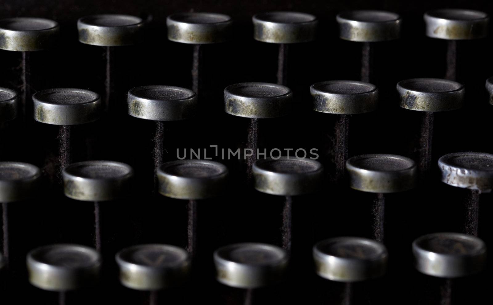 Keyboard of a vintage typewriter in close up, frontal view