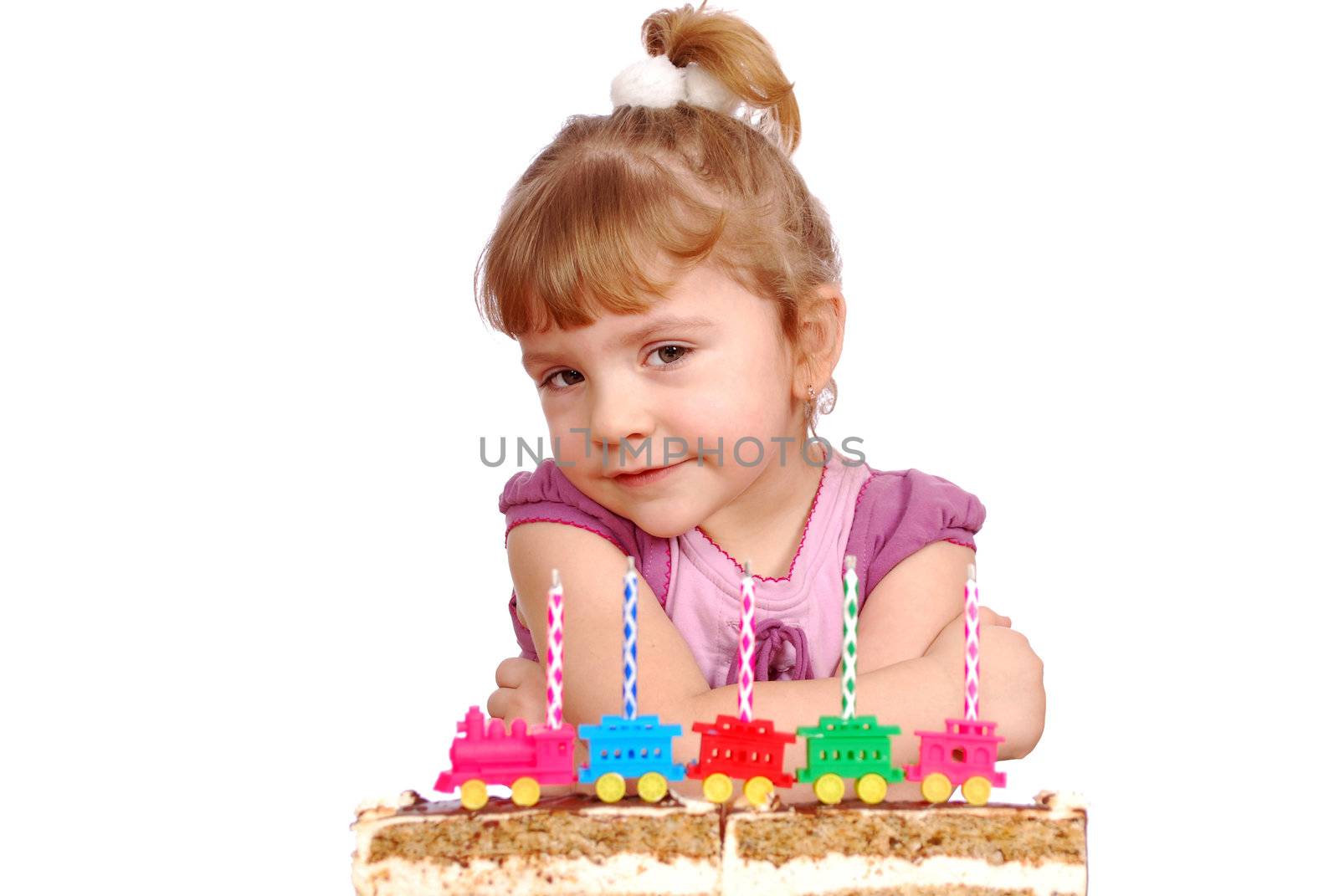 Little girl with birthday cake studio shot