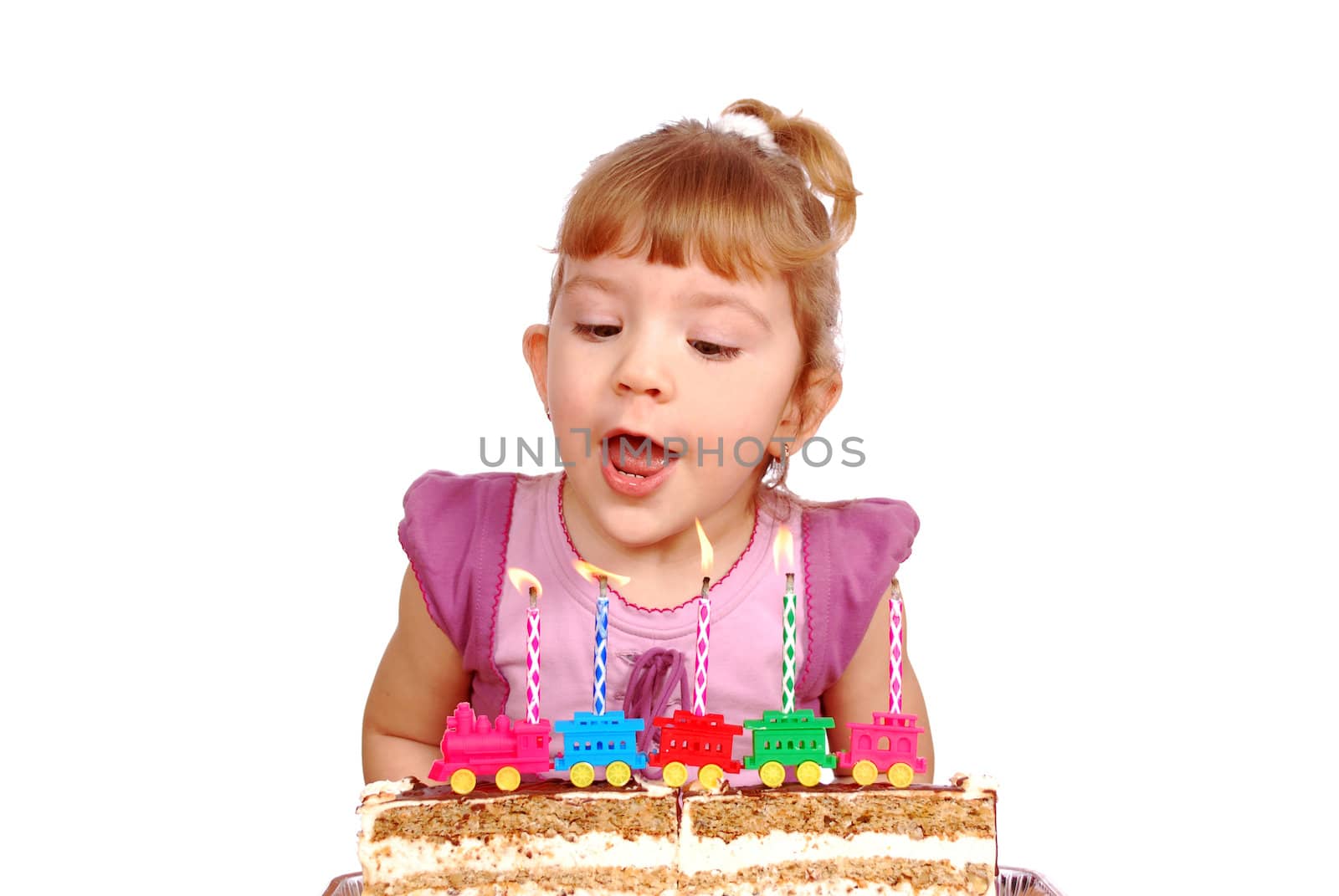 Little girl with birthday candles and cake studio shot