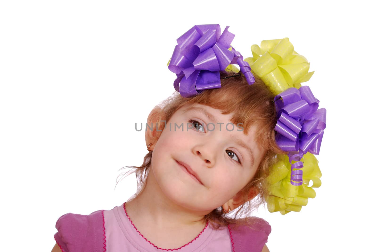 Beauty little girl with colorful ribbons in hair