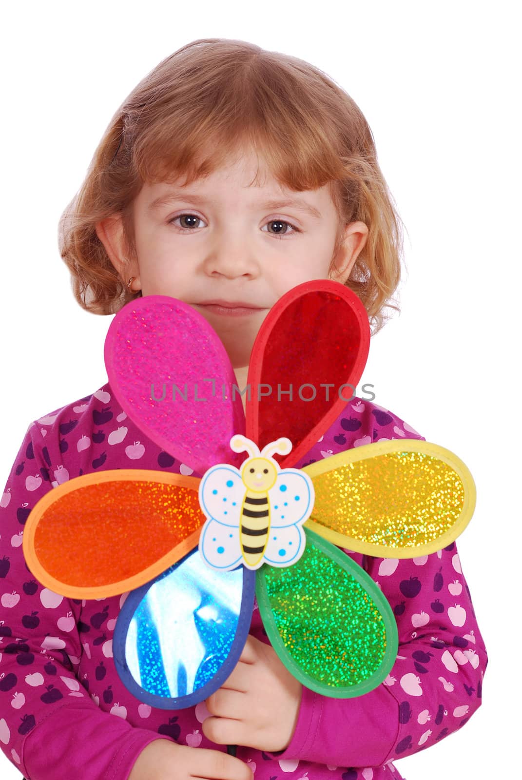 Little girl with toy studio shot