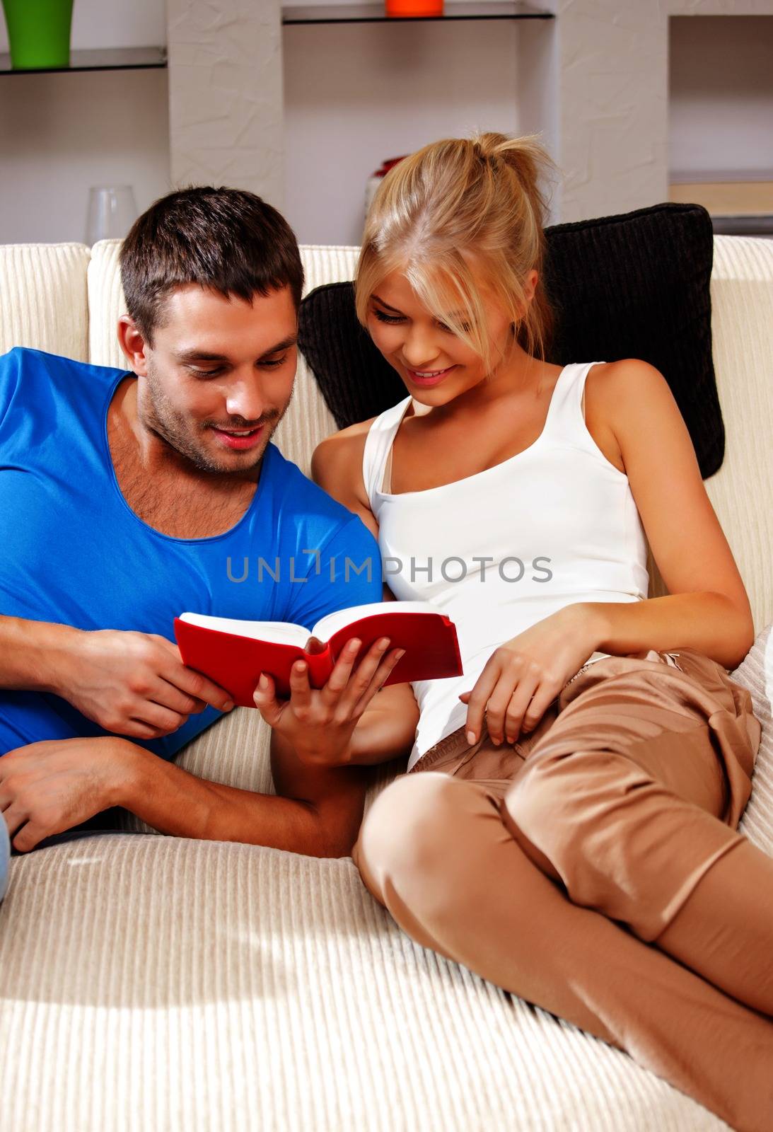 bright picture of happy couple with book