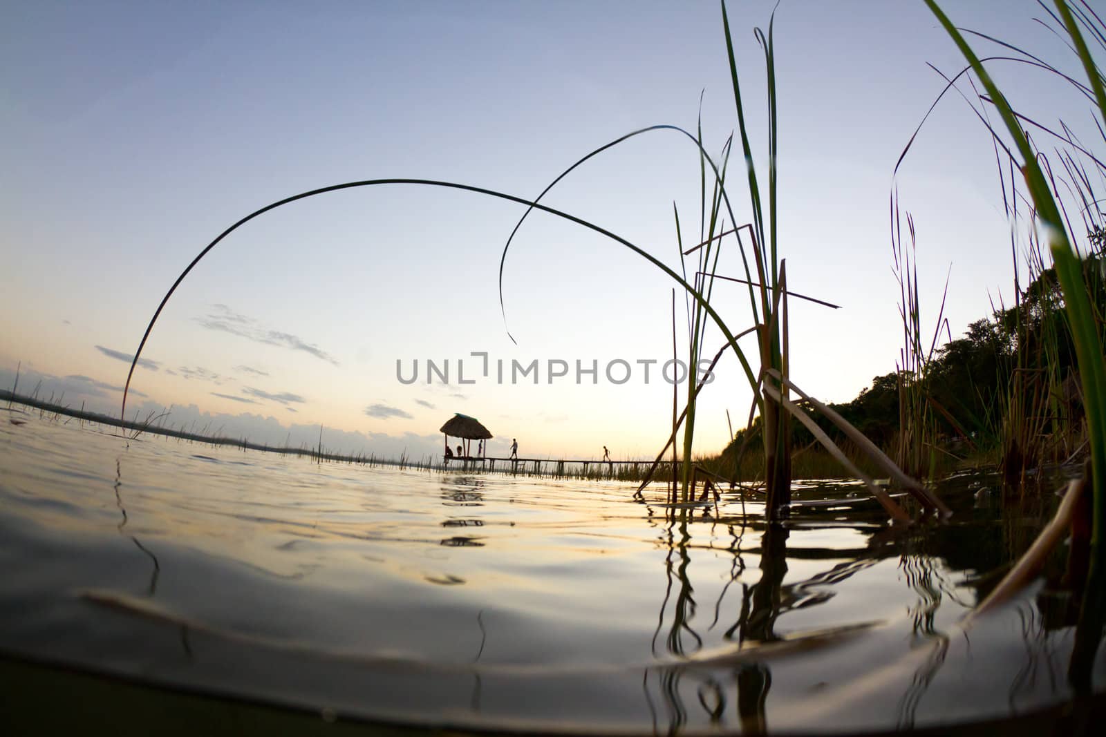 The sun goes down over lake peten in Guatemala