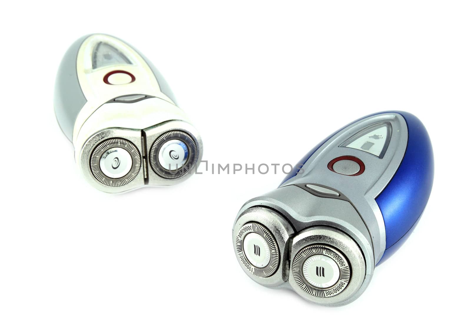 two electric shaver isolated with white background by geargodz
