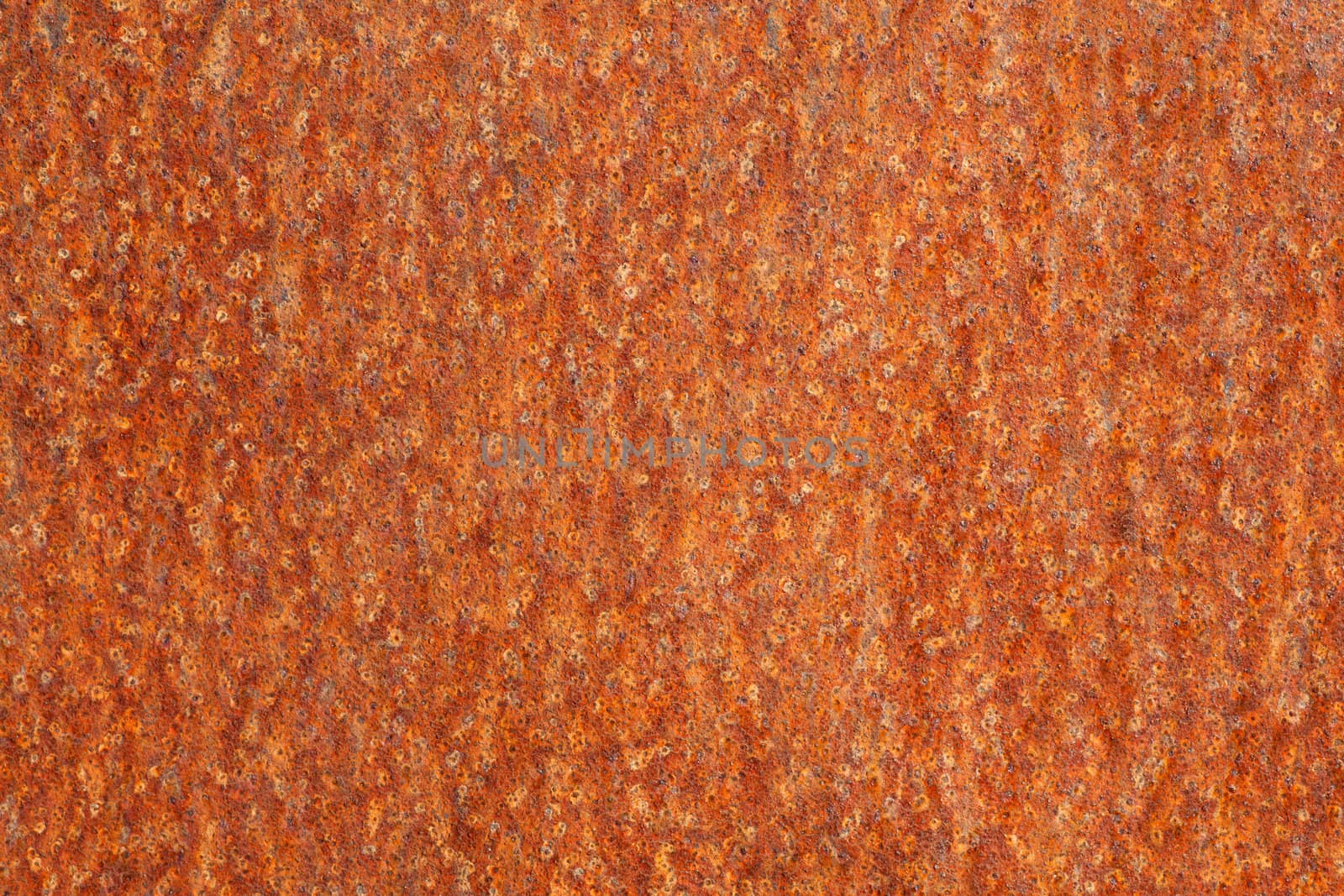 closeup of rusted steel in orange and red