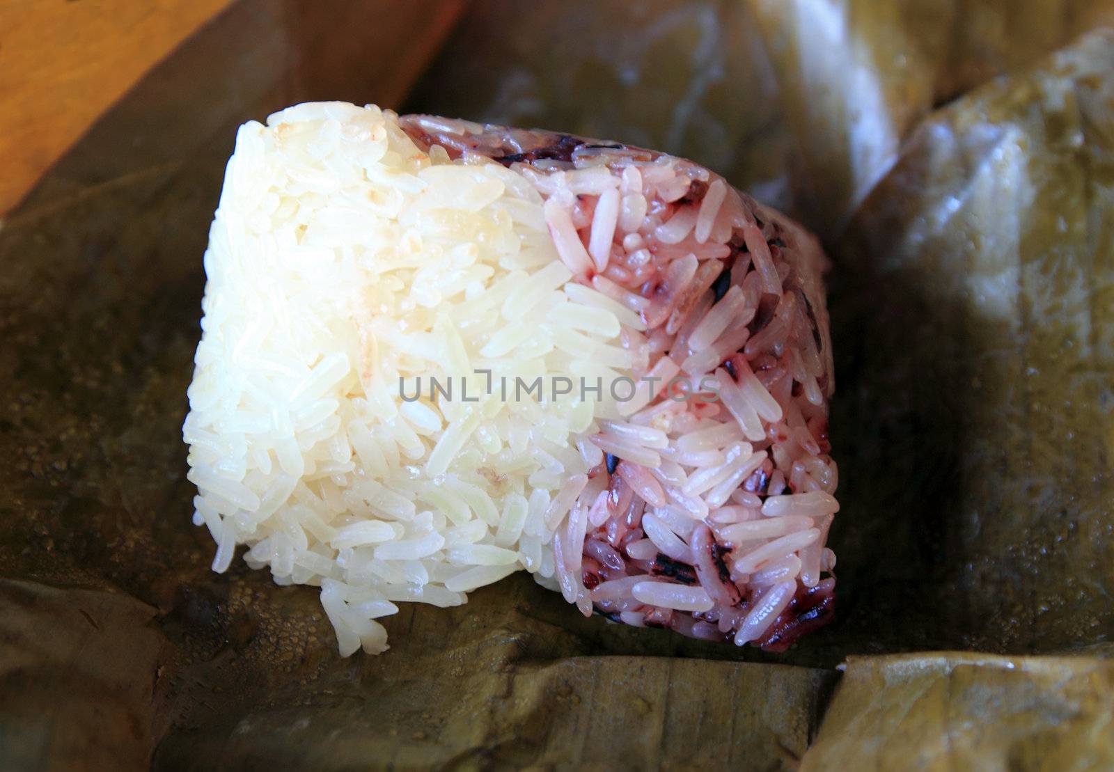 glutinous rice wrapped in banana leaves by geargodz
