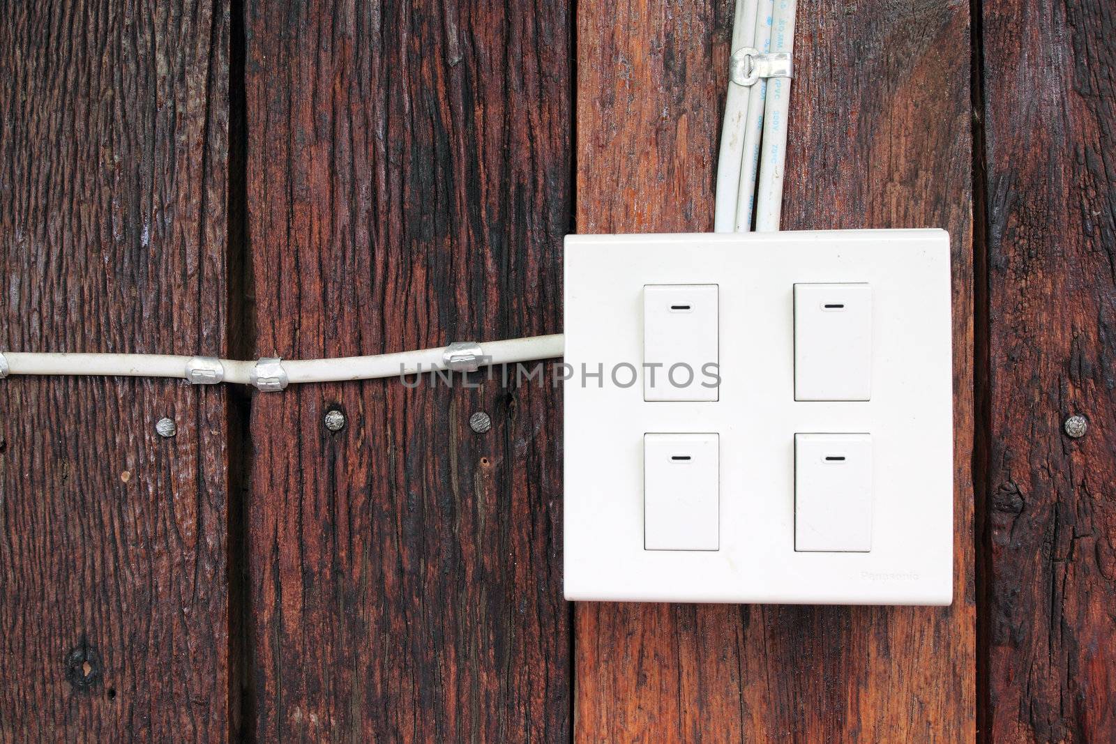buzzer switch on wooden wall by geargodz