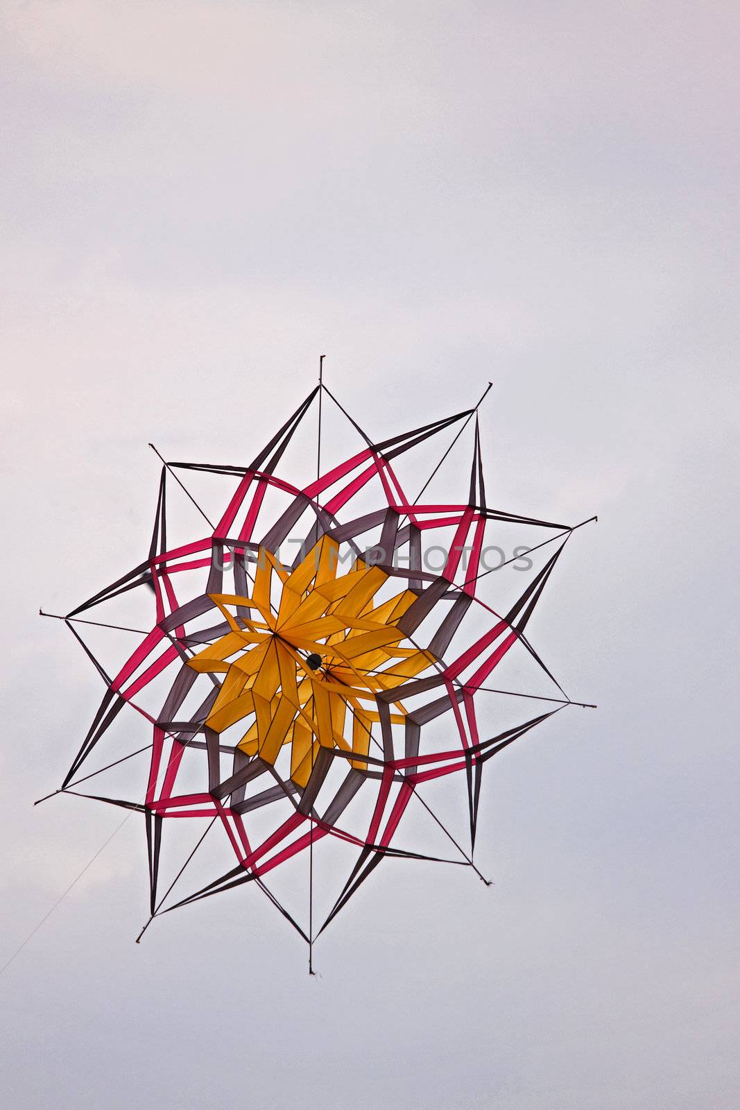 Twenty-sided balsa wood kite riding the wind