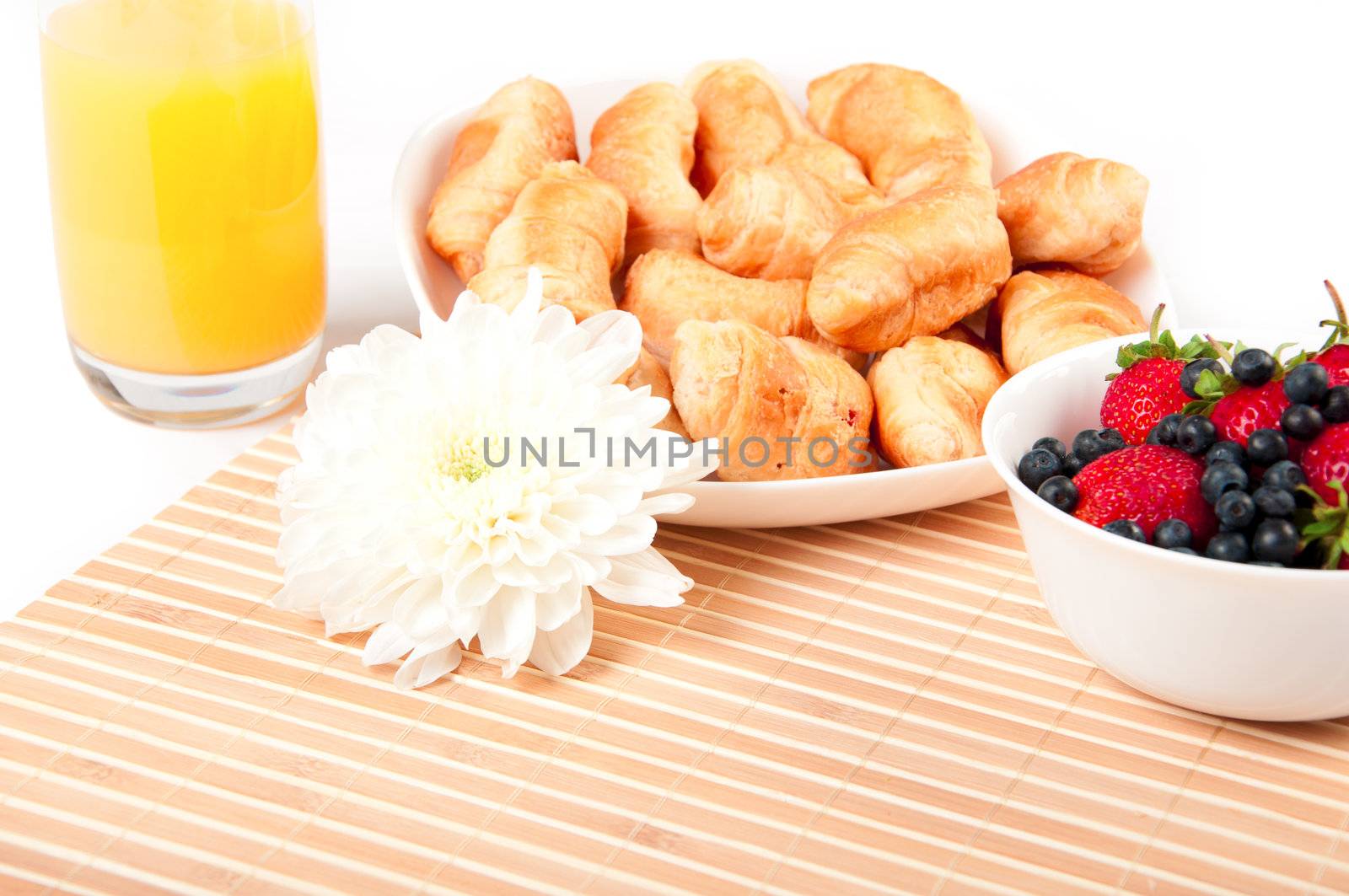 Breakfast with berries,orange juice and croissant by adam121