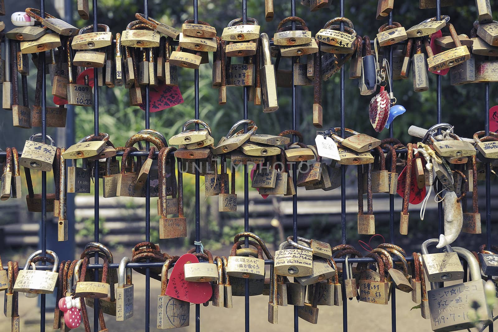 Enoshima Island, Japan -June 7, 2008 : many love padlocks hanged in the Dragon Love Bell area at the top of famous Enoshima Island.  It is believed a couples love will continue forever if they ring the bell together.