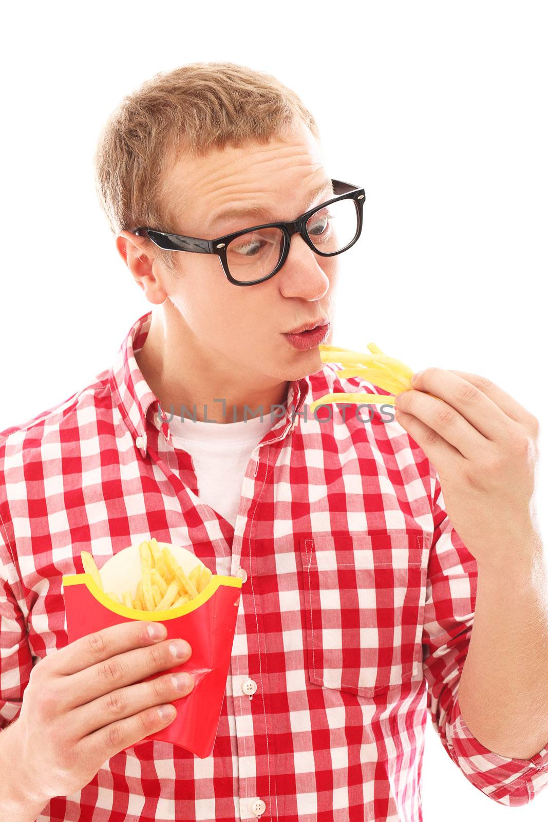 Funny man in glasses with crisp french fries and hamburger