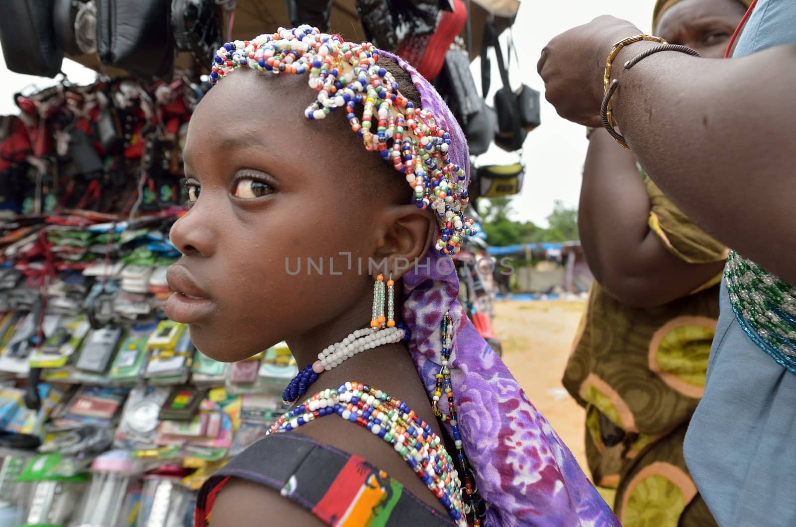 Kartiak,Senegal-September 18,2012 :An unidentified child go to a ritual of Boukoutt of Initiation ceremony on September 18, 2012 in Kartiak, Senegal. The ceremony occurs every 30 years and celebrates boys becoming men.