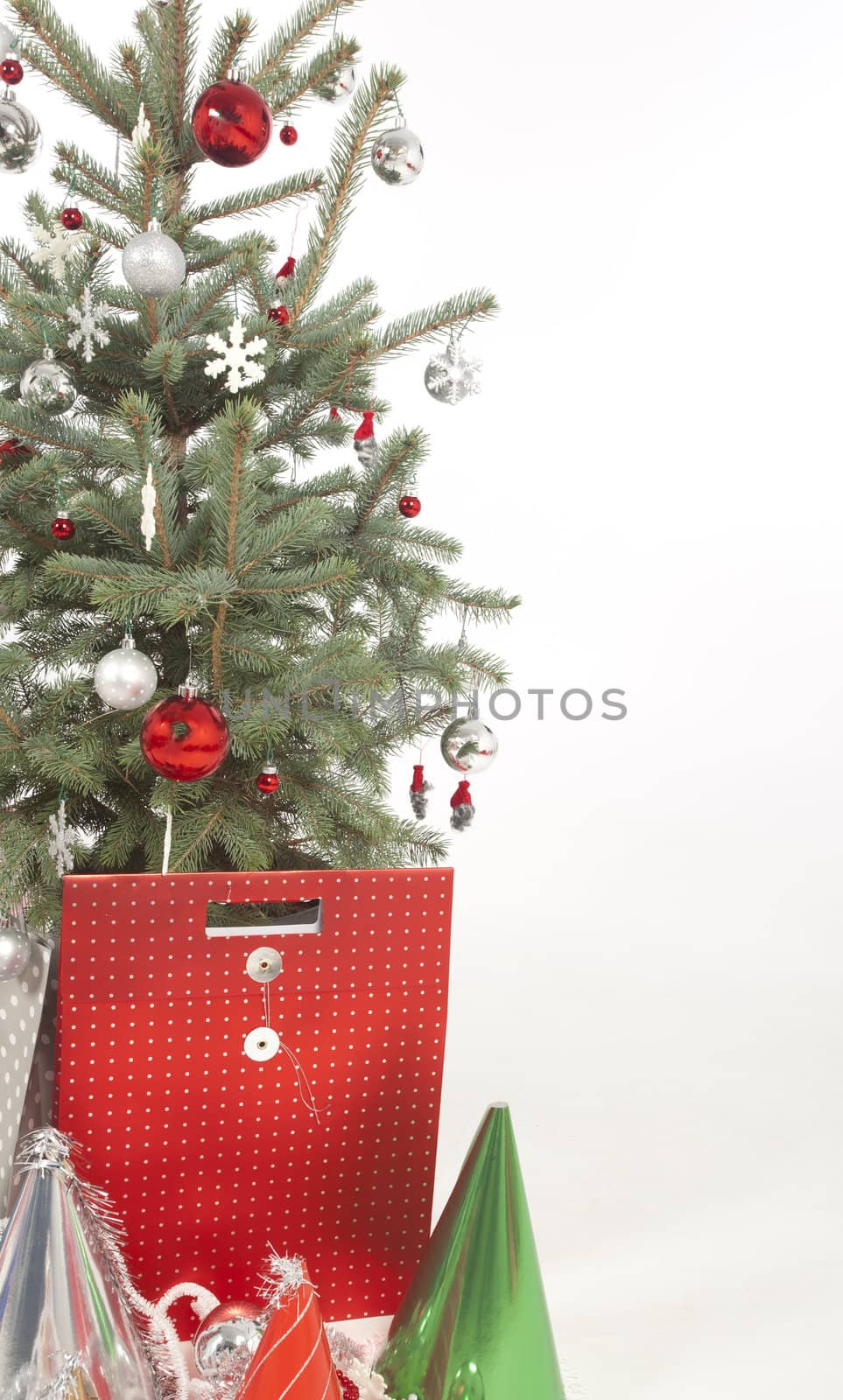 Decorated Christmas tree on white background