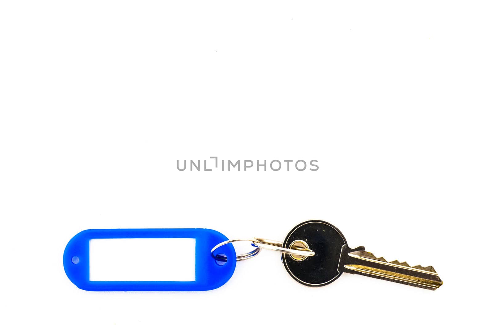 Key with a blank tag, isolate on white background. Add your text on the tag.