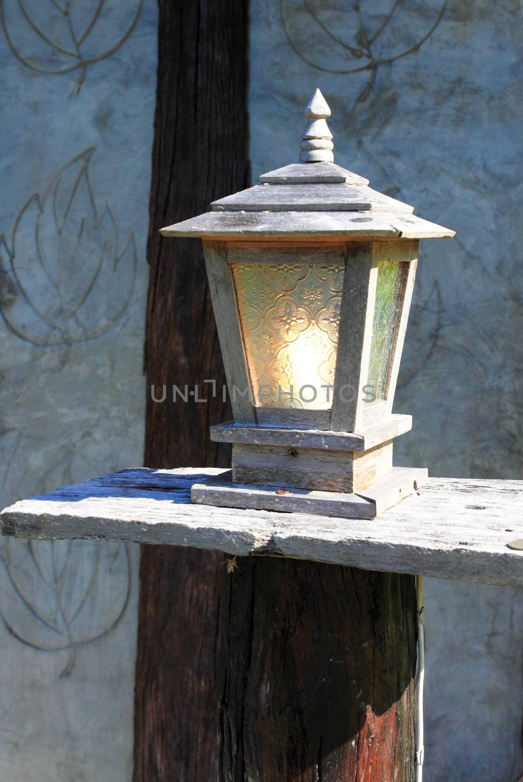 wood ancient lamp in resort at Khaokho, Thailand