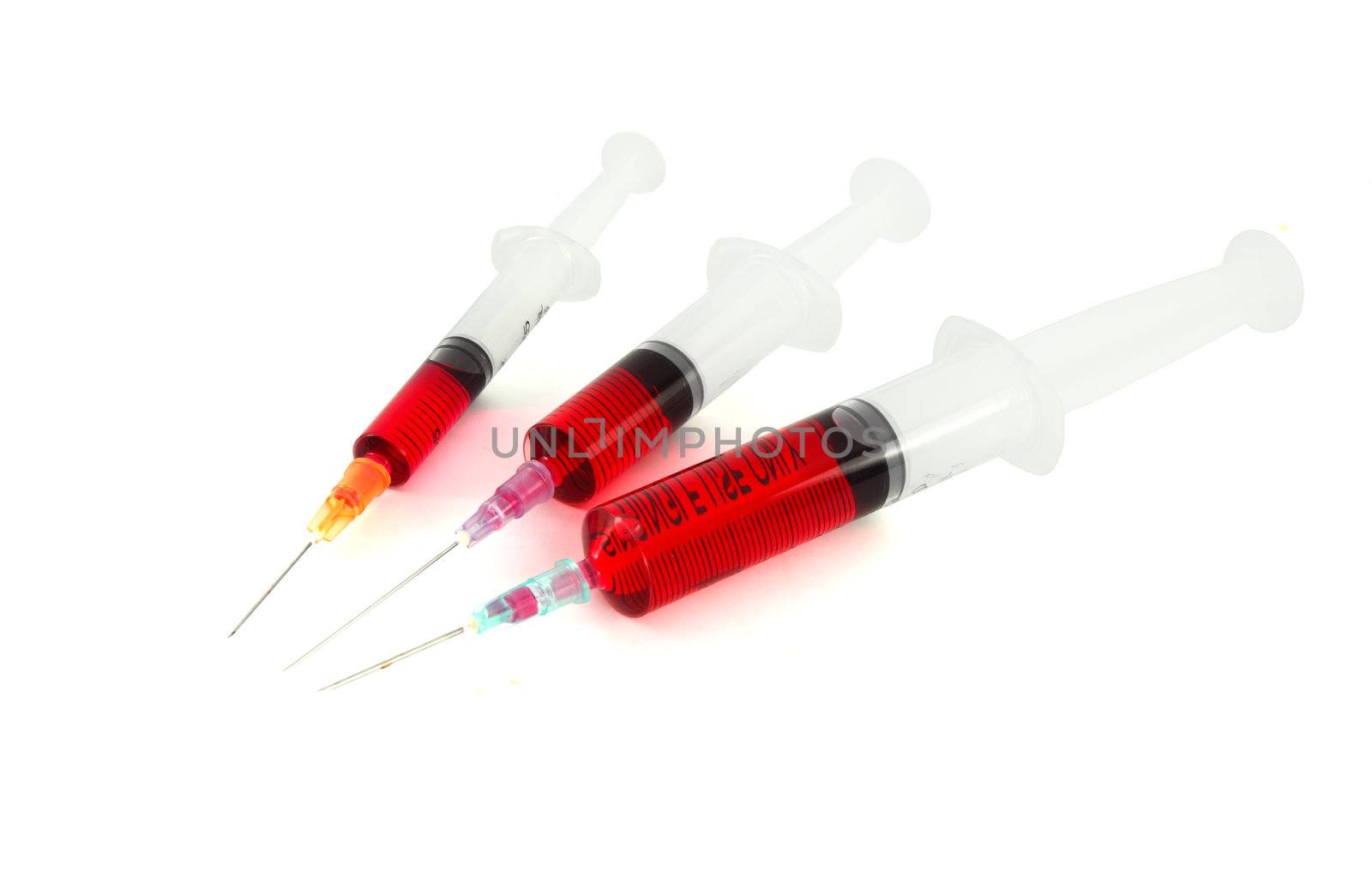 Three syringe against white background by geargodz