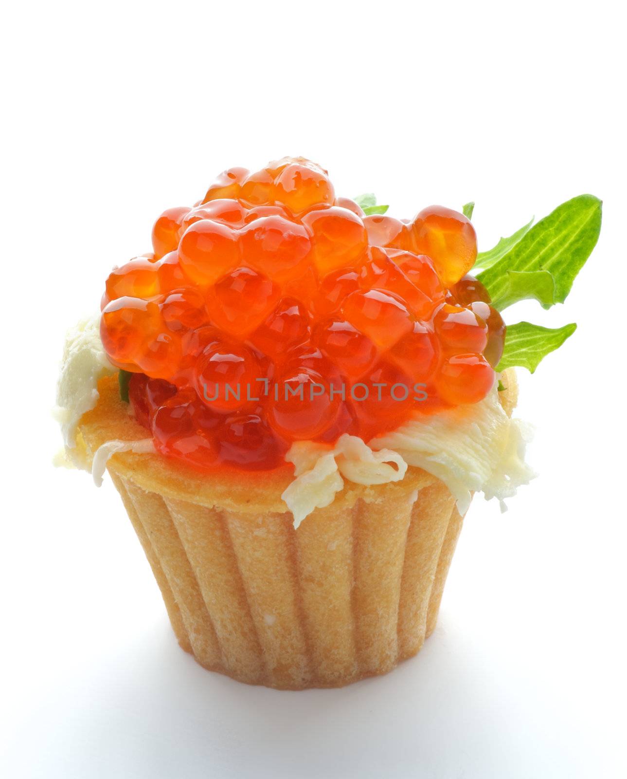 Perfect Red Caviar in Tartlet with Butter and Greens closeup on white background