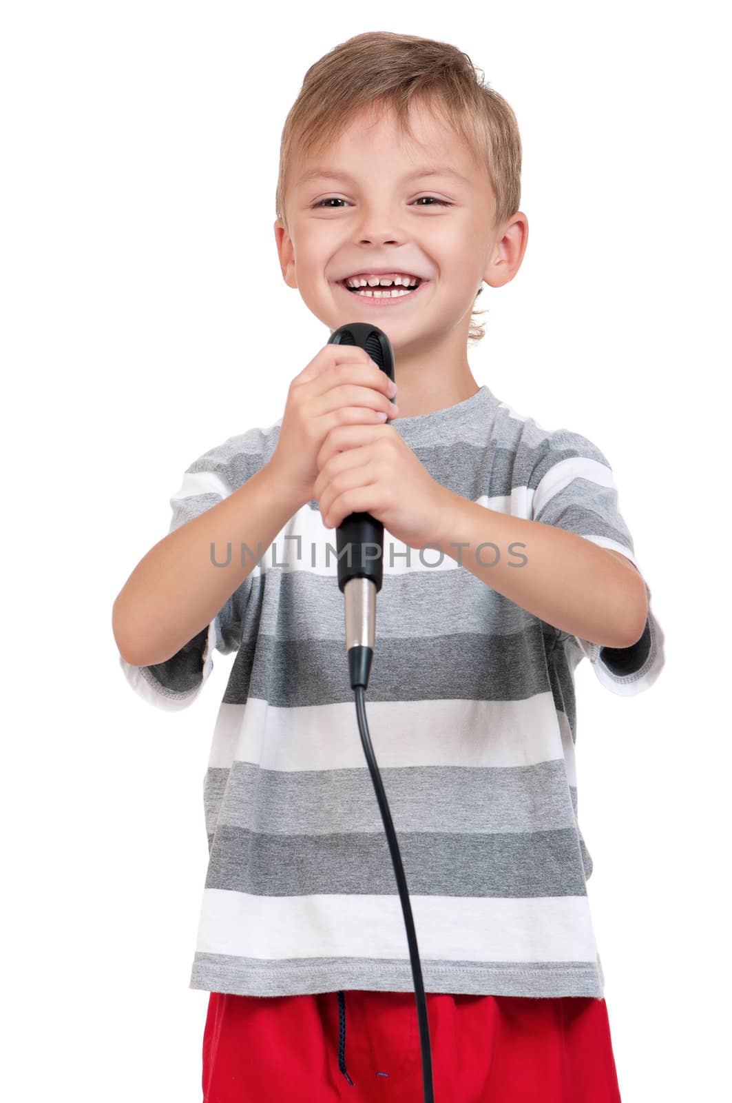 Little boy with microphone - isolated on white background