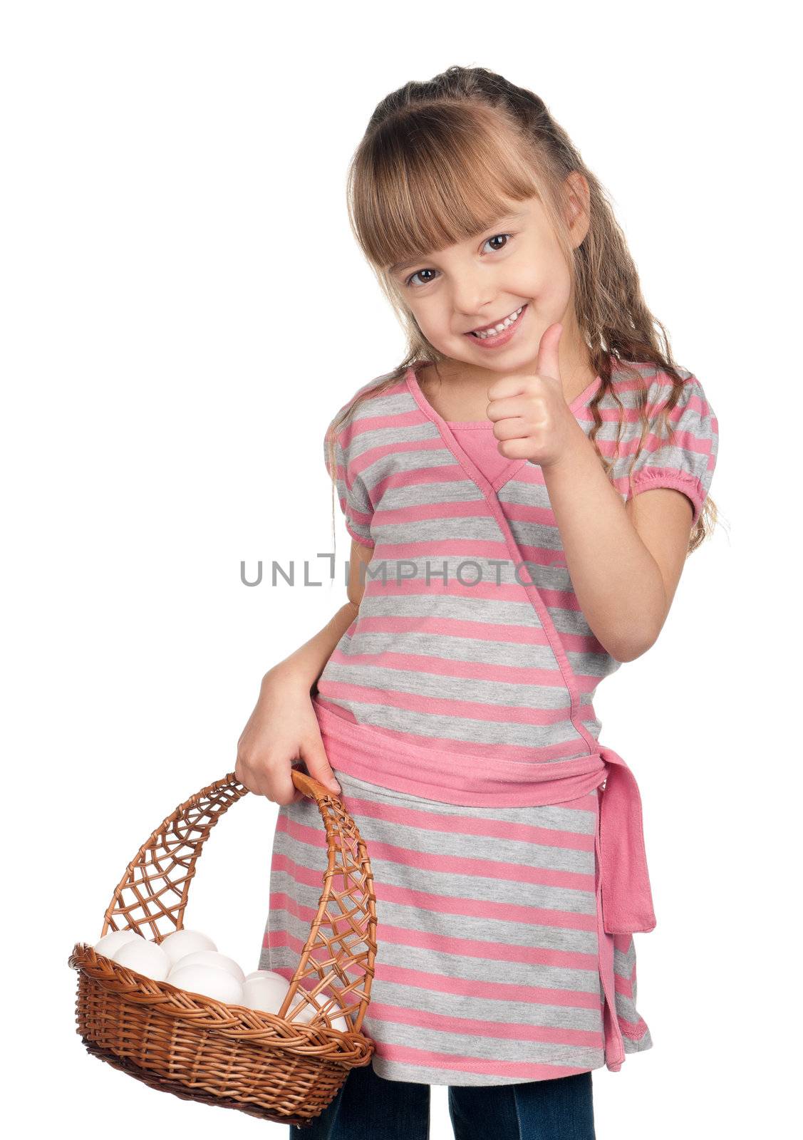 Happy little girl holding basket of eggs and giving you thumb up over white background