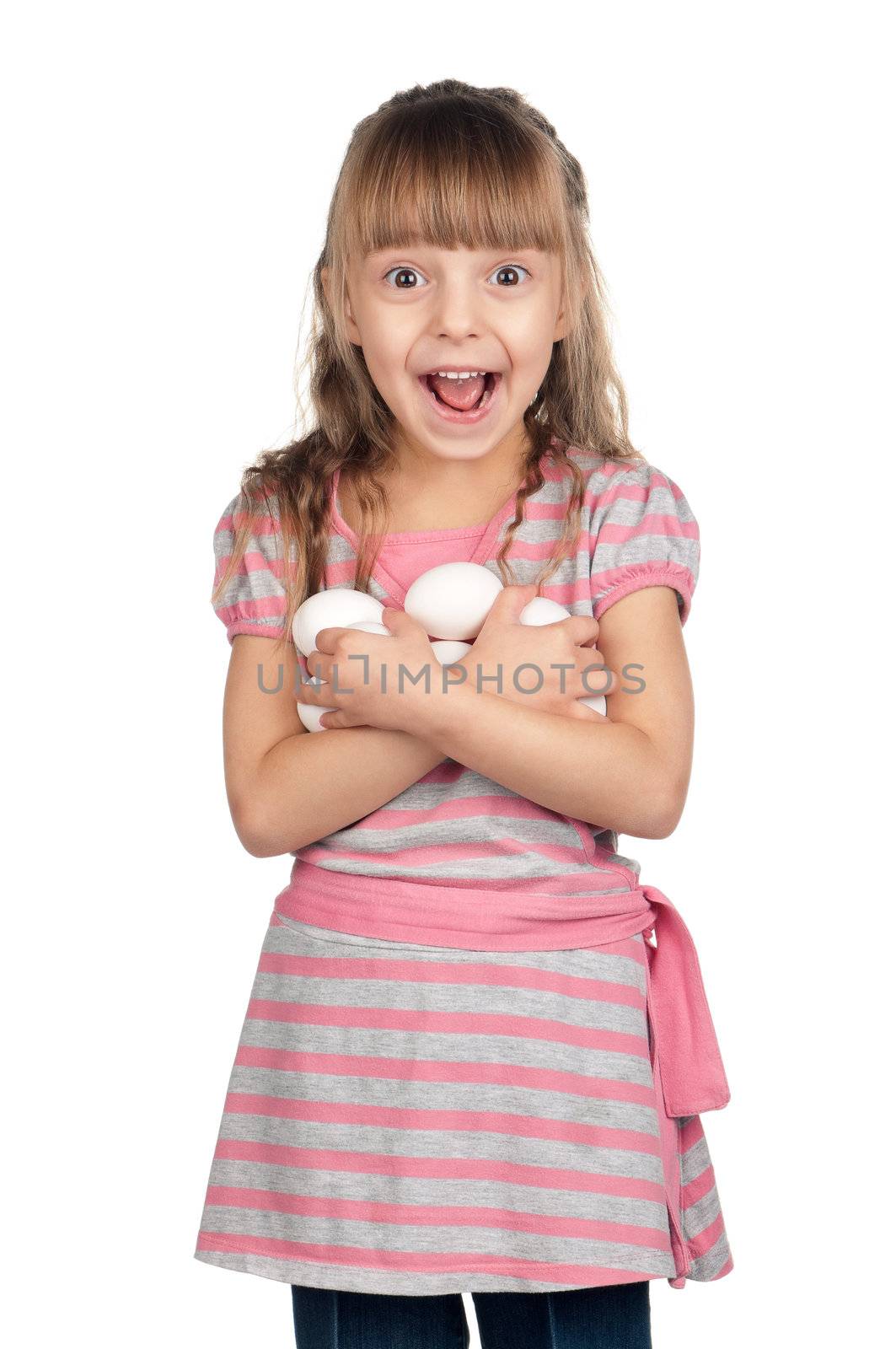 Surprised little girl holding eggs over white background