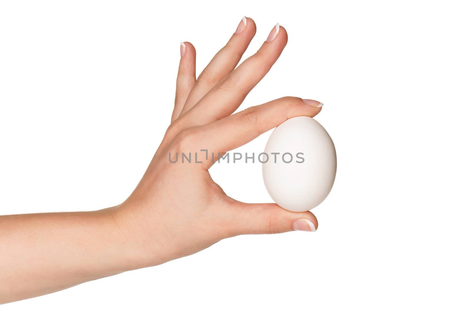 Woman hand with egg isolated on white background