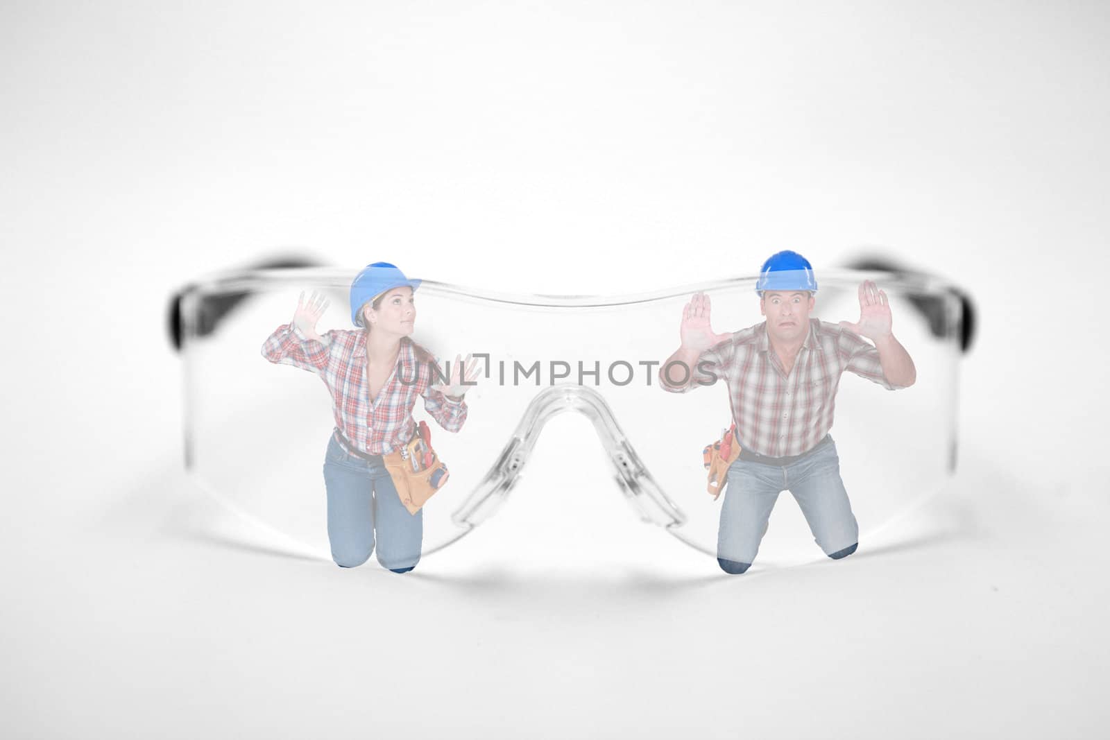 Man and woman stuck behind giant protective goggles by phovoir